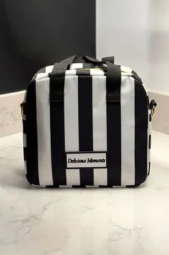 Cristina Oria Bolsos, Bolsas Y Neceseres|Otros Textil^Bolsa Isotérmica Blanca Y Negra Con Mensaje “Delicious Moments”